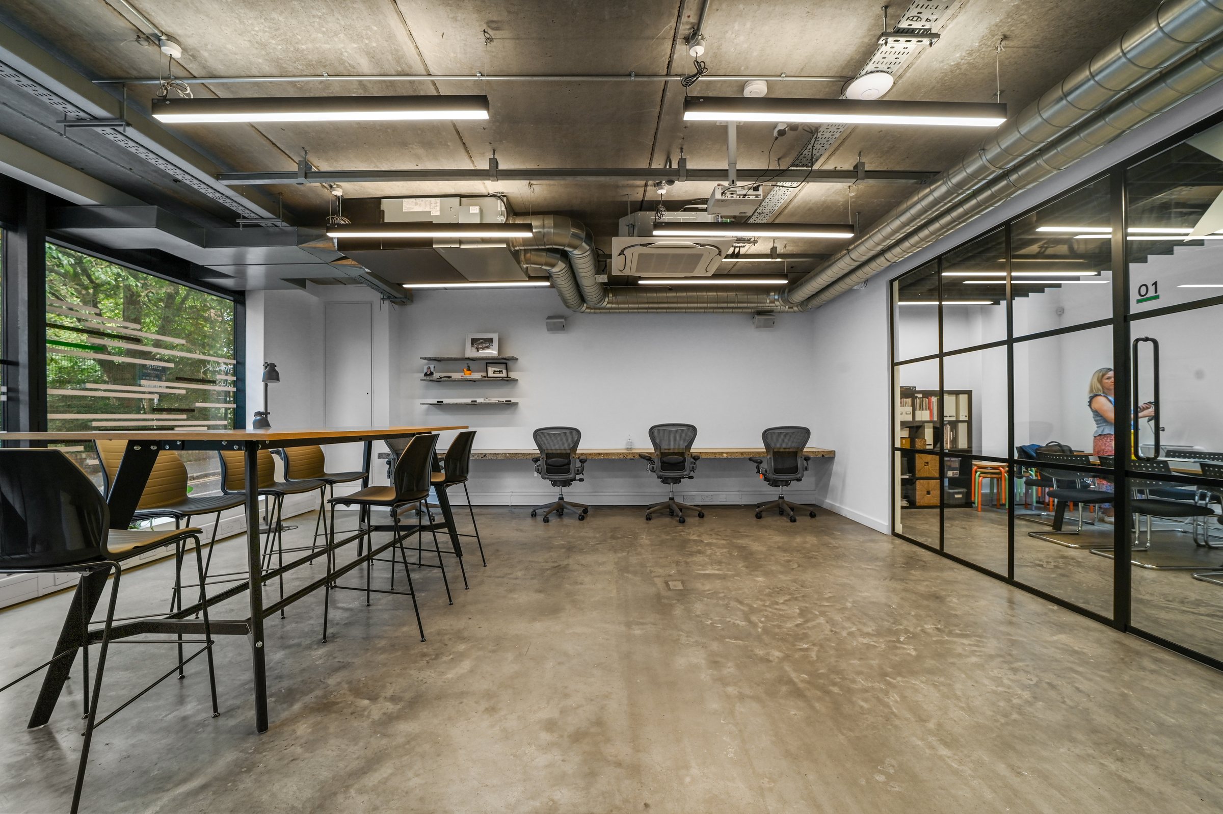 Ground-floor workspace with exposed services